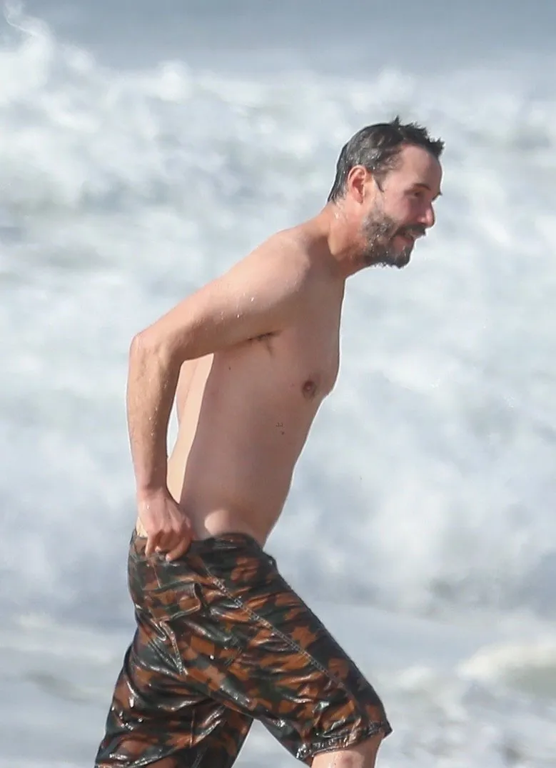 Keanu Reeves shirtless beach