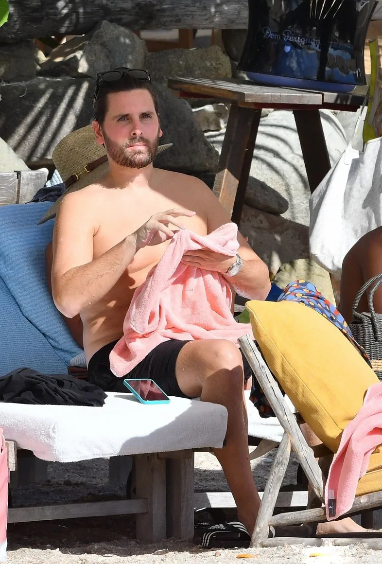 Scott Disick sunbathing